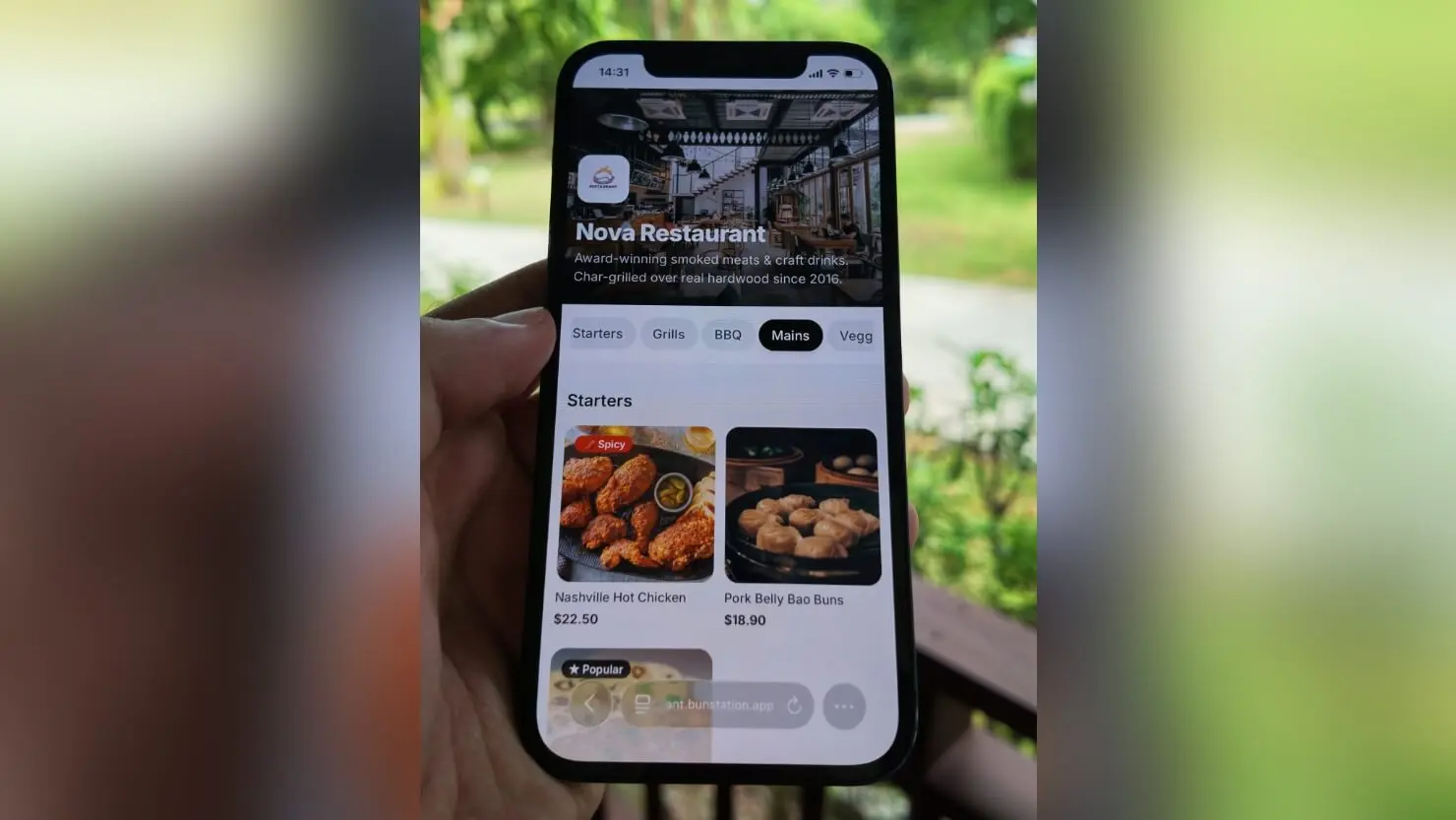 Digital QR code restaurant menu open on a phone at the table